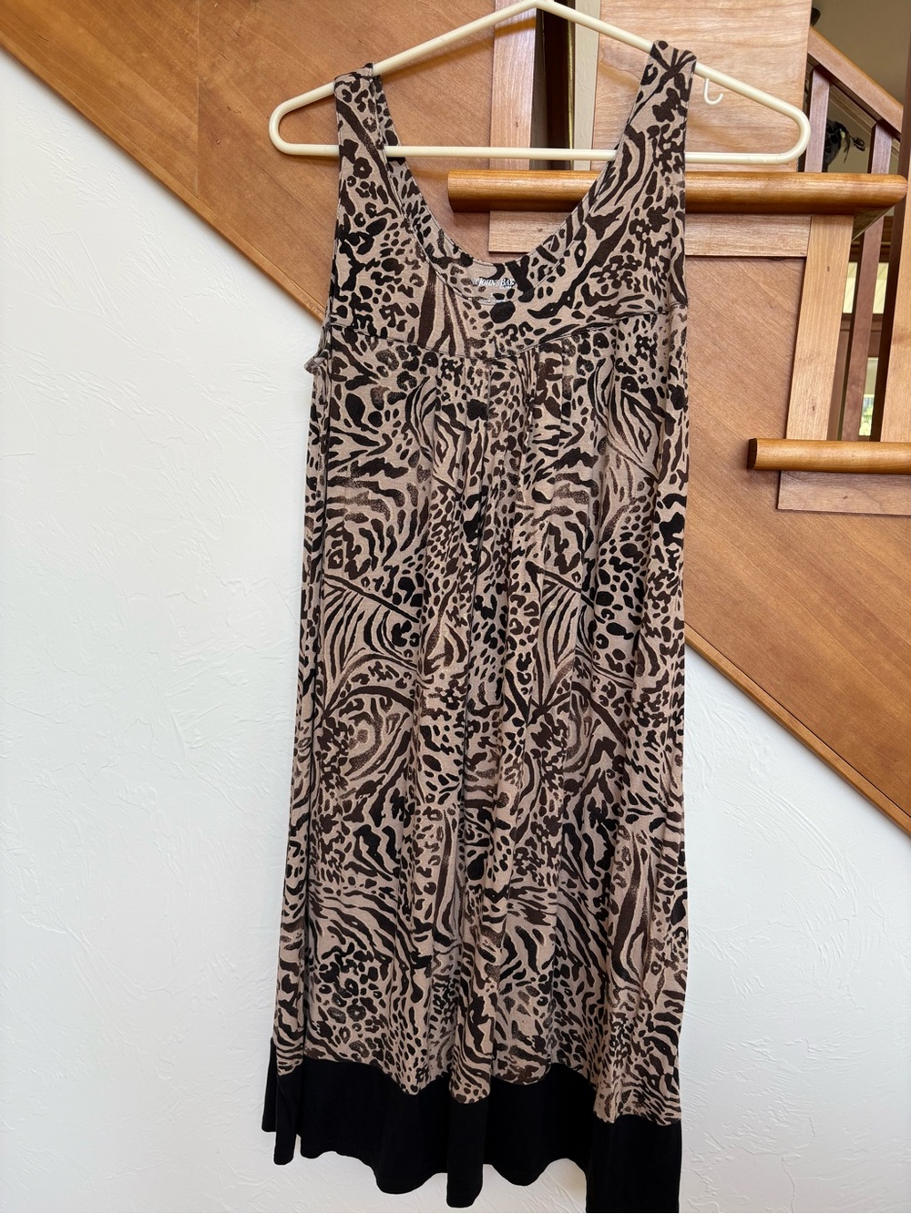 NWOT Super cute Sleeveless Animal Print Swing Dress in Tan and Black flattering